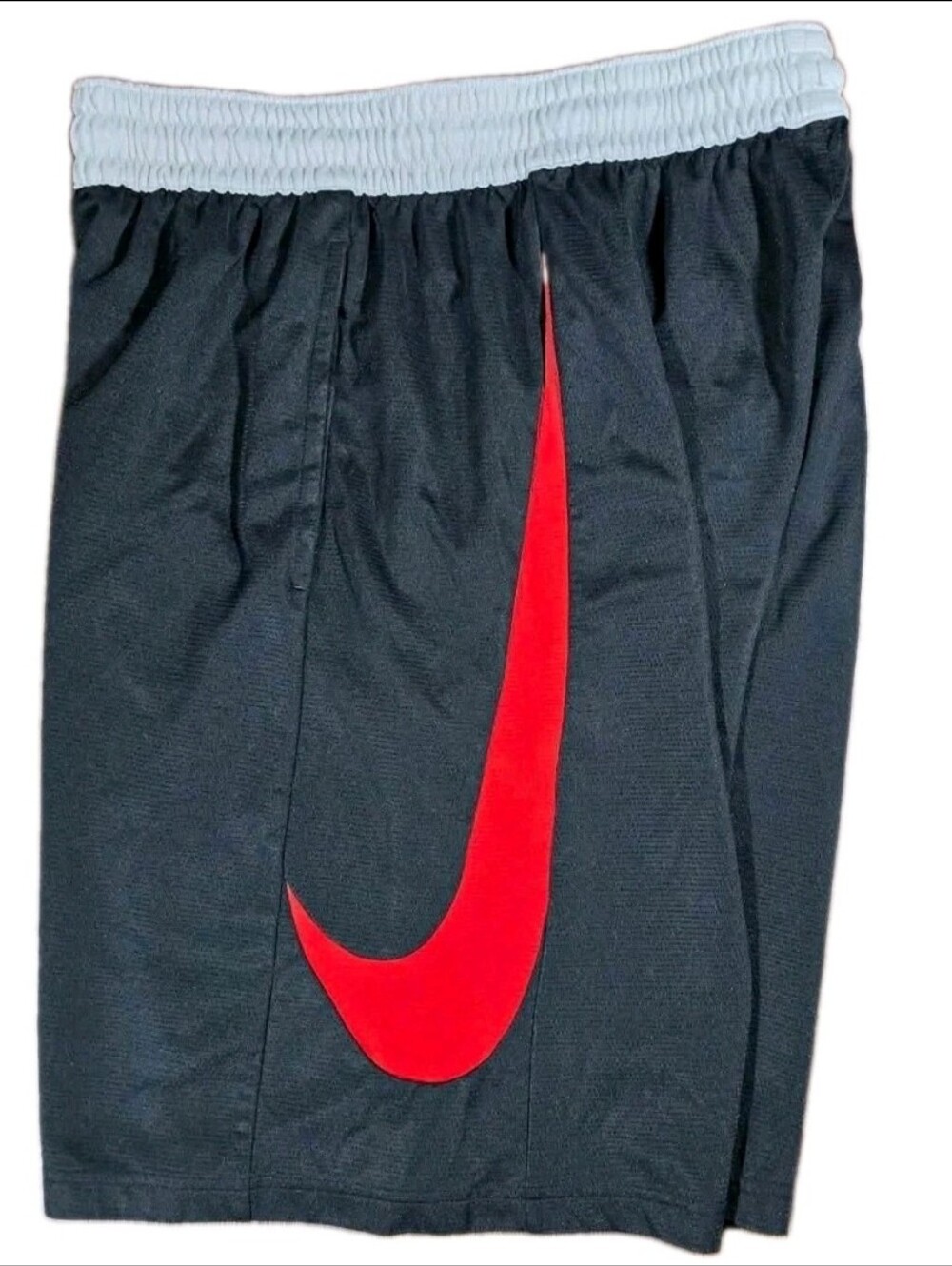 Nike Kids Black Athletic Shorts with Red Swoosh